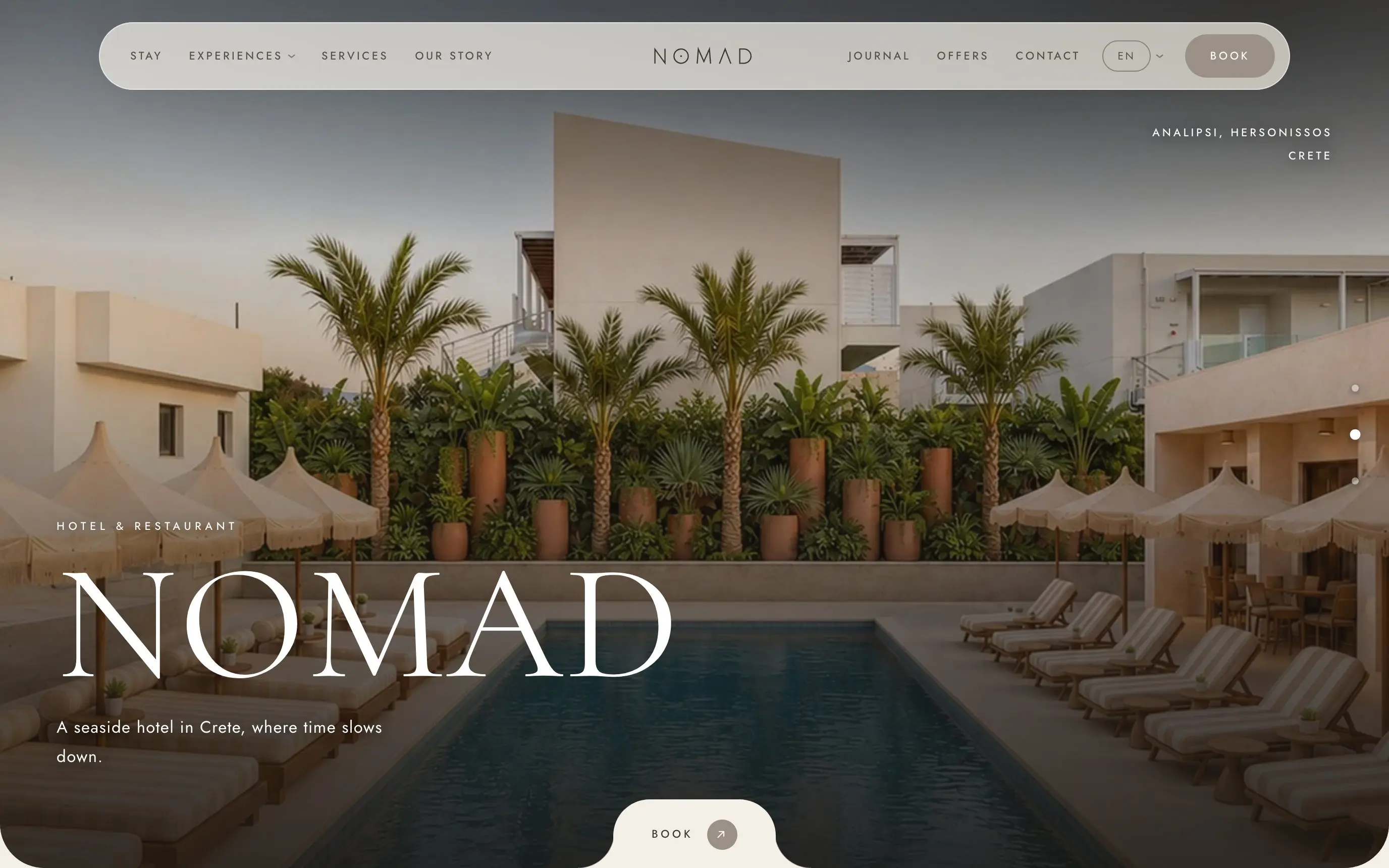 The nomadslowliving.com homepage: a pool with palm trees and parasols, the NOMAD headline and the location Analipsi, Hersonissos, Crete top right